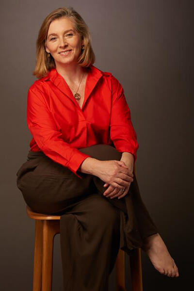 portrait of woman on a stool